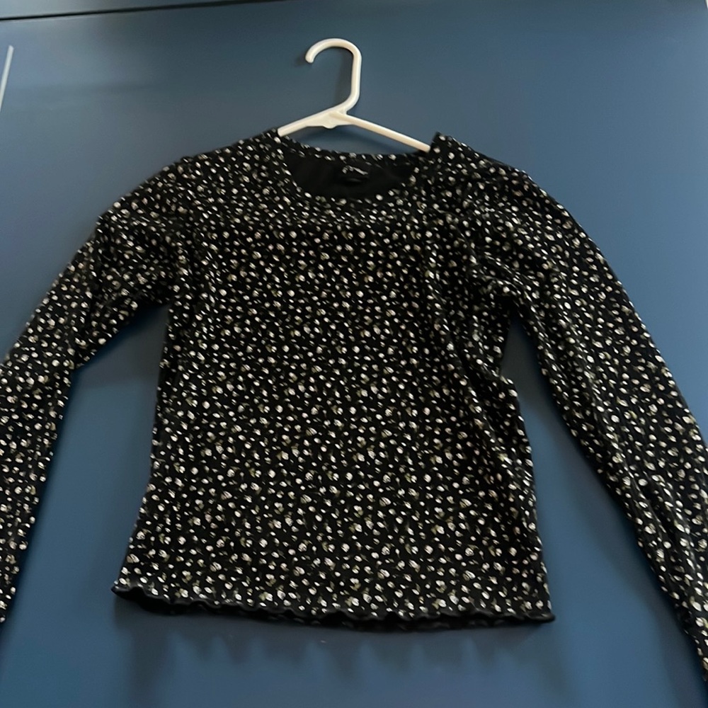 Black with flowers along sleeve